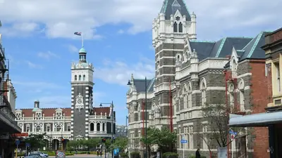 Photo of Dunedin Railway Station and the Dunedin Law Courts