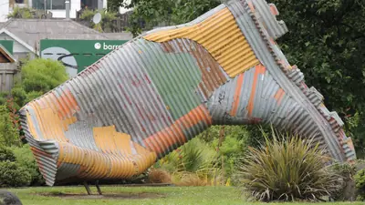 Photo of the giant corrugated iron gumboot sculpture in Taihape